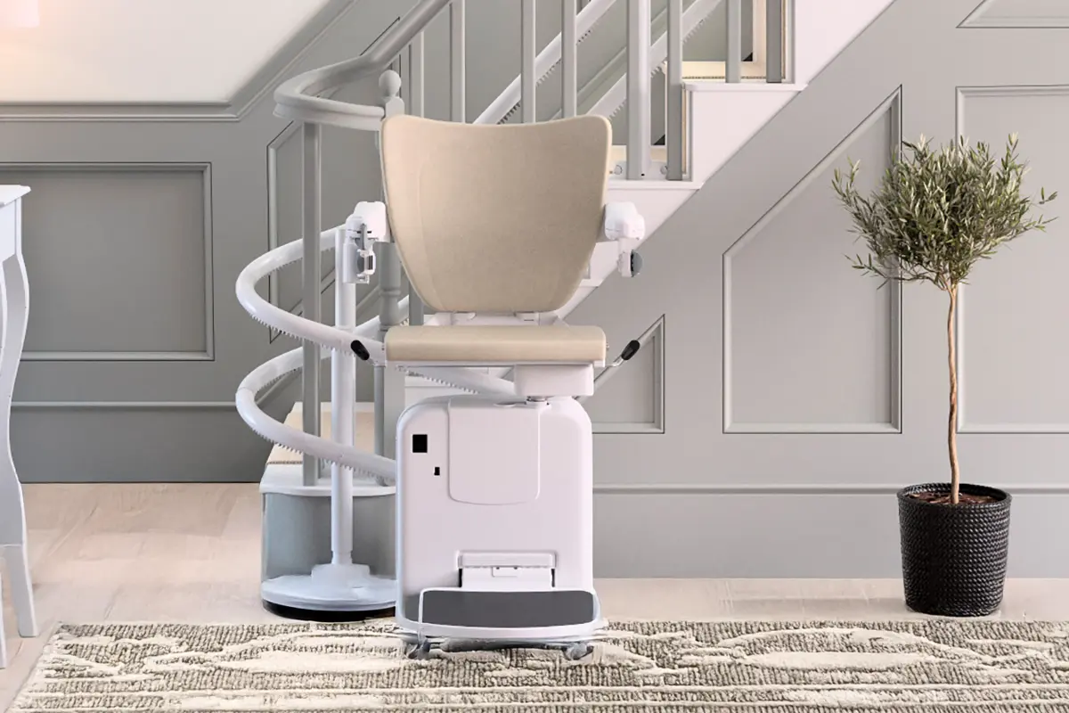 Curved stairlift installed on a two-flight domestic staircase